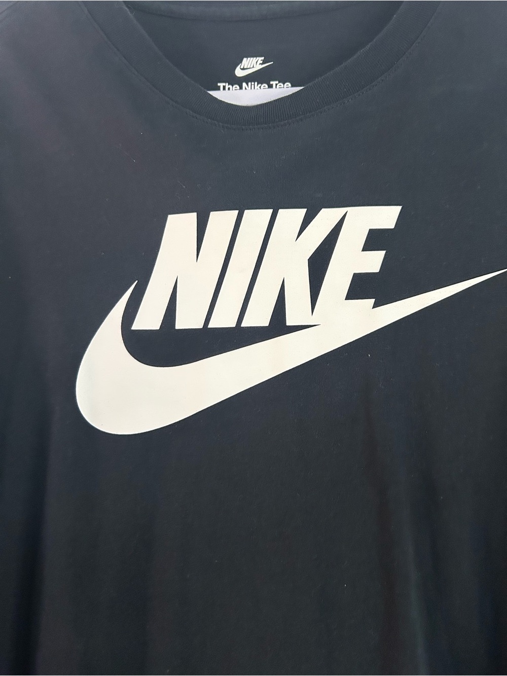 Nike Men's Black Tee with White Swoosh Logo